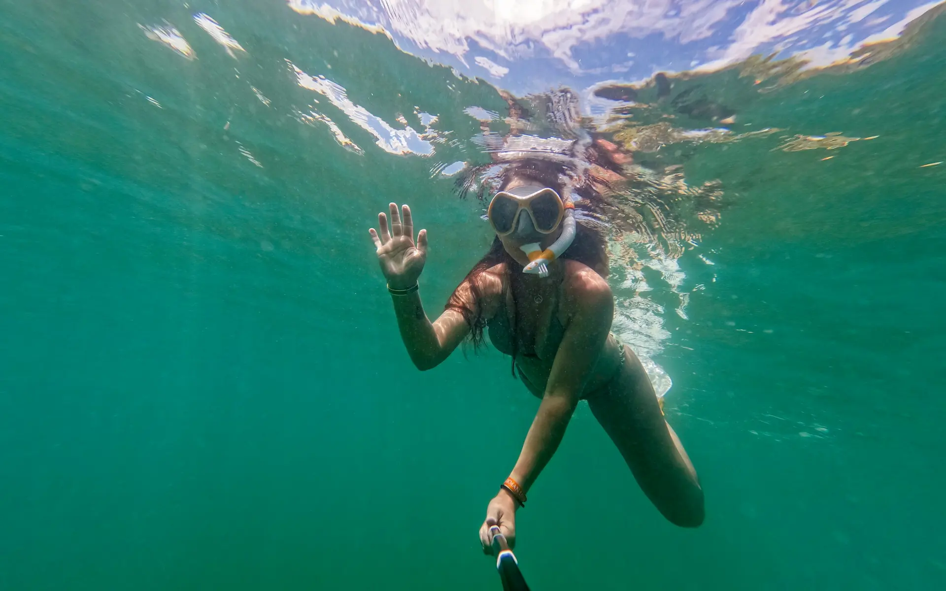 Snorkelling the bright, clear shallows off Sofia K